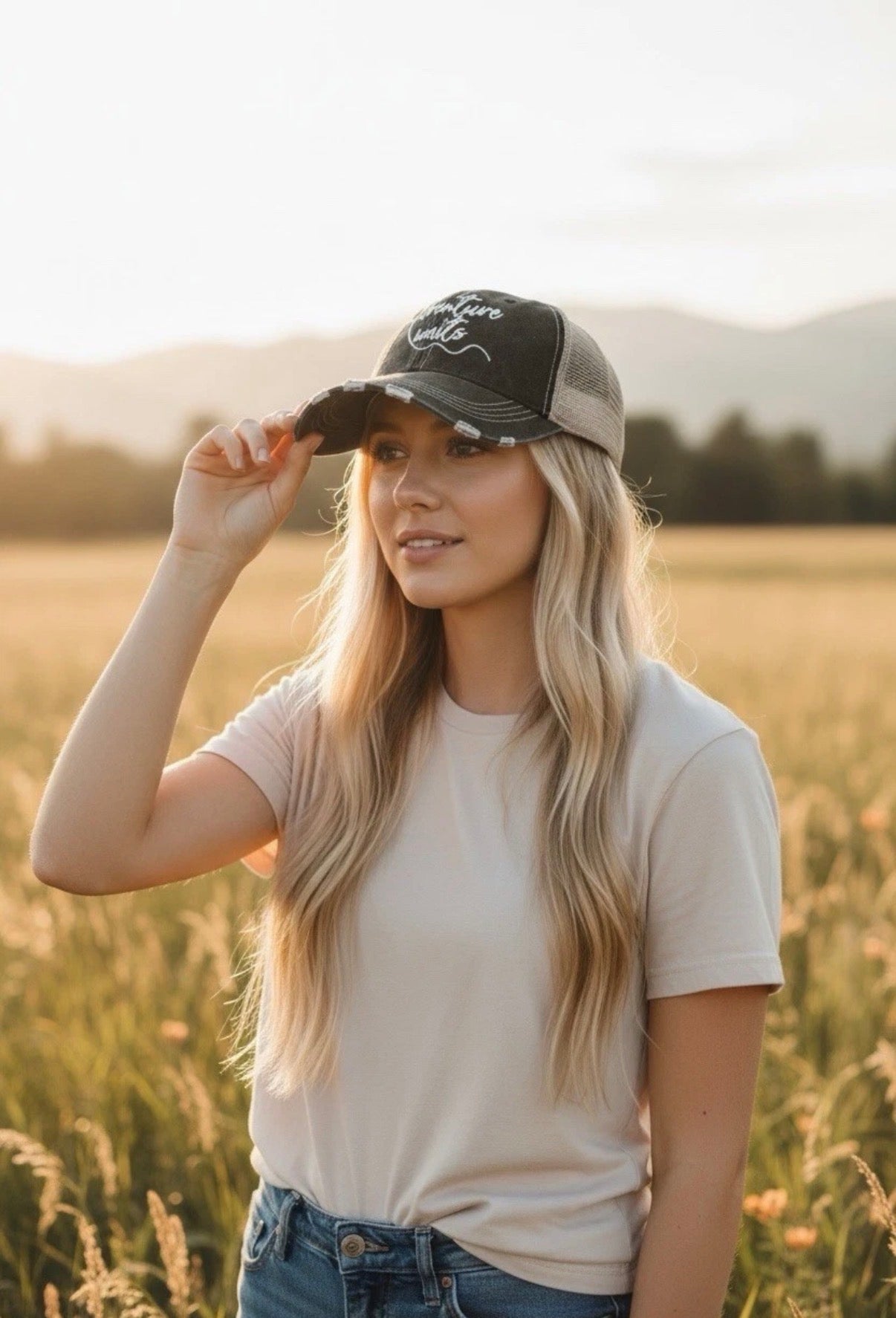 Distressed Black/White Trucker Hat “Adventure Awaits” Adjustable Snapback