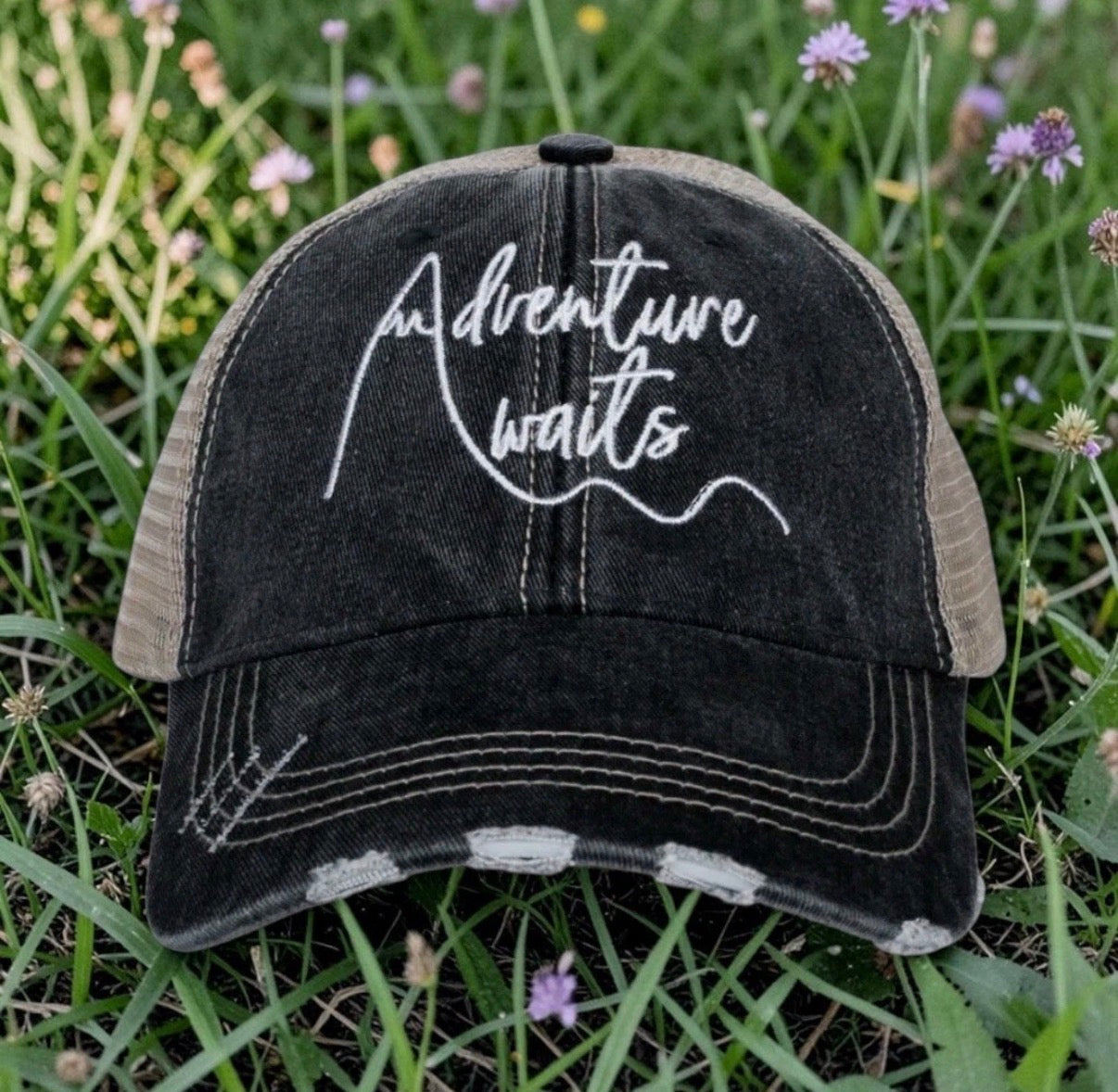 Distressed Black/White Trucker Hat “Adventure Awaits” Adjustable Snapback