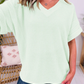 LemonDrop•LimePop mint green waffle knit V-neck short sleeve relaxed fit top with cuffed sleeves.