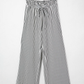 LemonDrop•LimePop black and white striped wide-leg palazzo pants with tie waist and elasticated waistband.