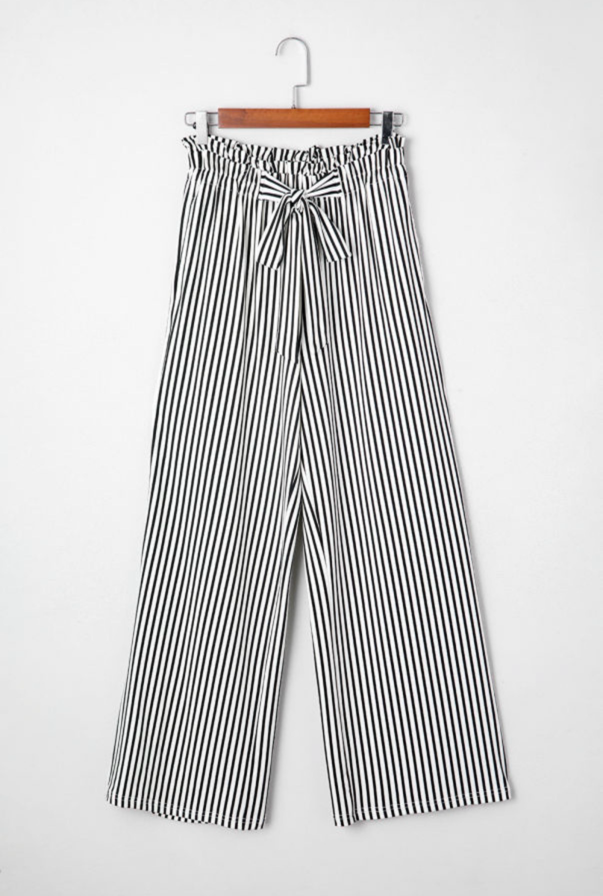 LemonDrop•LimePop black and white striped wide-leg palazzo pants with tie waist and elasticated waistband.
