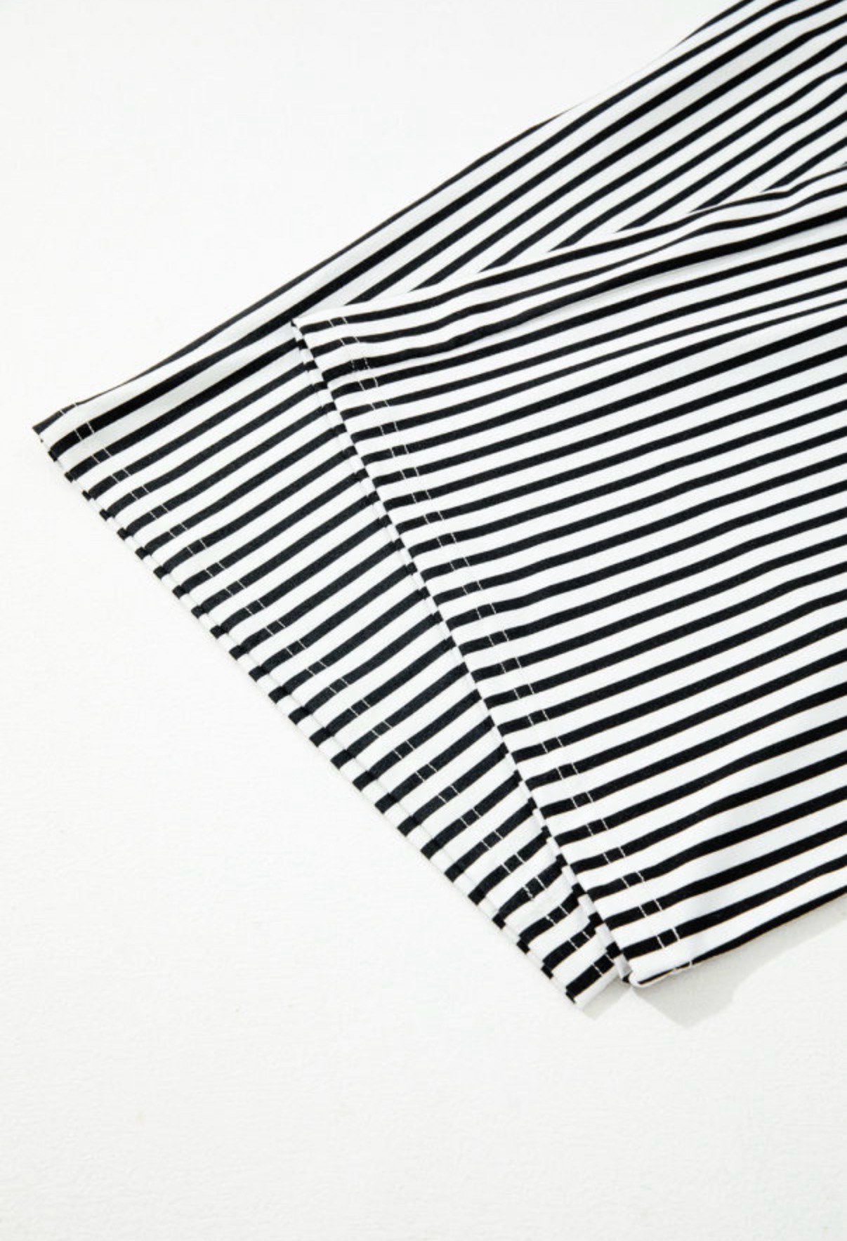 LemonDrop•LimePop black and white striped wide leg palazzo pants with tie waist and side pockets.